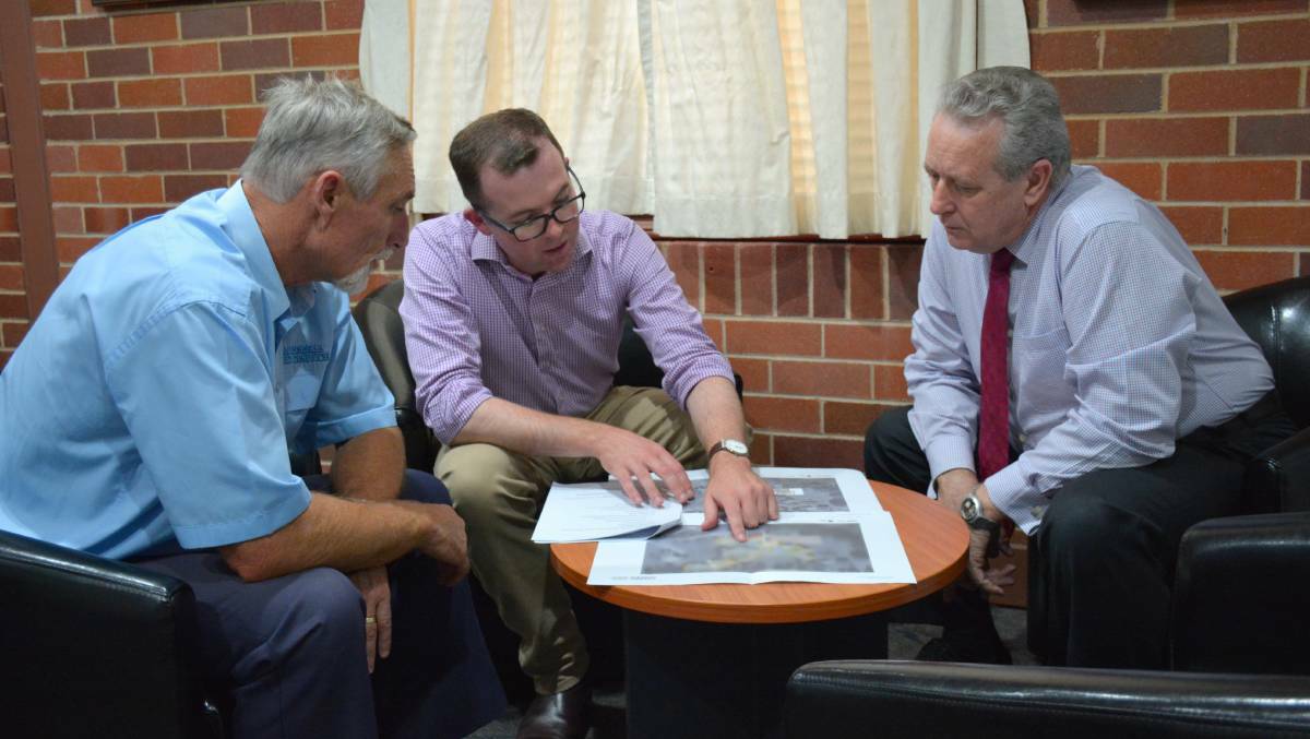 EXAMINING: Inverell mayor Paul Harmon, Member for Northern Tablelands Adam Marshall and council general manager Paul Henry have a look at the redevelopment plans in March, 2017, before they were submitted to Treasury.