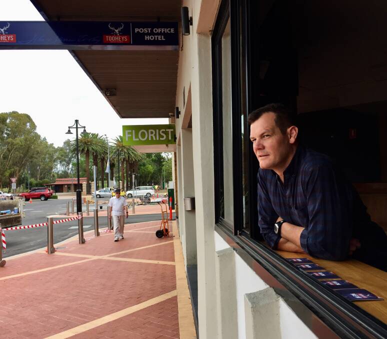 HAPPY IT'S DONE: Post Office licensee Andrew Coutts thinks the Fitzroy St upgrade will be good for town. Photo: Jacob McArthur