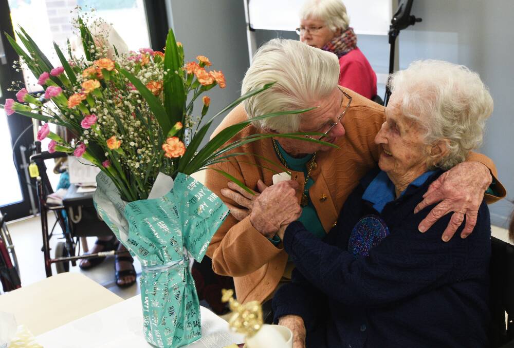 HAPPY BIRTHDAY: Doalis Fester embraces fellow Nazareth resident Leopolda Figar who turns 103 on Sunday. Photo: Gareth Gardner 140717GGB03
