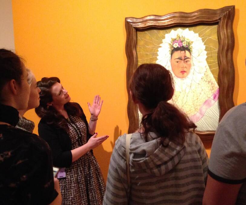 SYDNEY LEARNING: Tamworth Gallery education officer Kate Armstrong conducting a tour of the Frida Kahlo exhibition while at the Art Gallery of NSW. Photo: Supplied