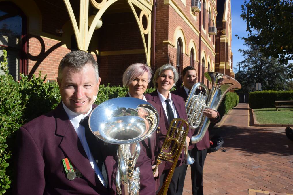 MARCHING ON: Stephen Sullivan, Noelen McGrane, Julie Roy and Samuel Hannan are tuning up for Anzac Day duties. Photo: Jacob McArthur