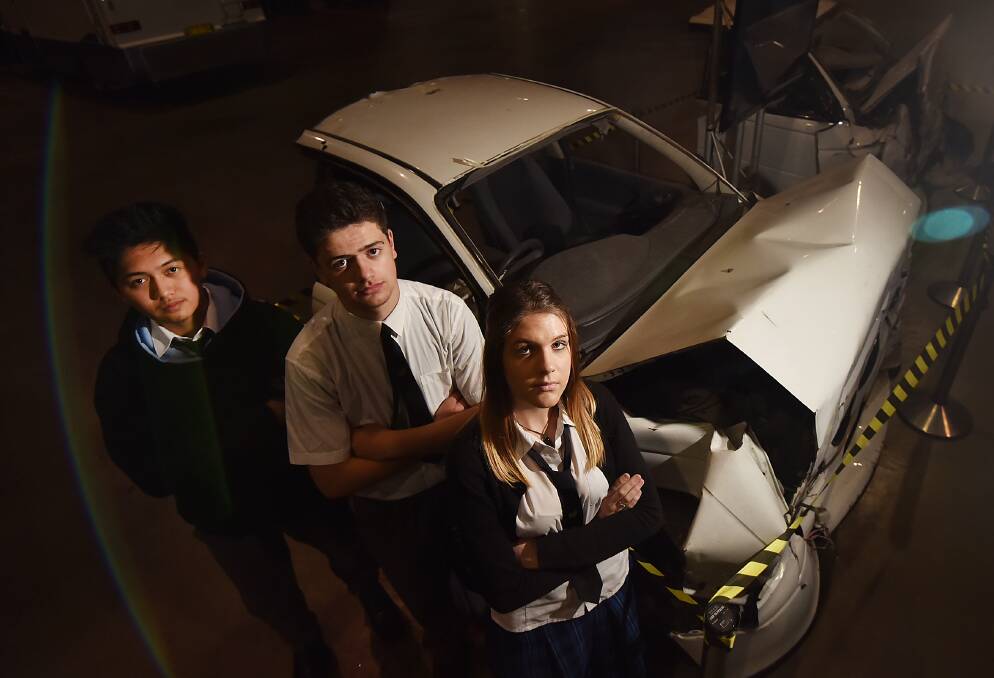 ROAD TO LEARNING: Tamworth High Year 11 students  Rodley Casdrods, Reid Martin and Amber Myhill confronting the consequences of road trauma. Photo: Gareth Gardner 240816GGD05