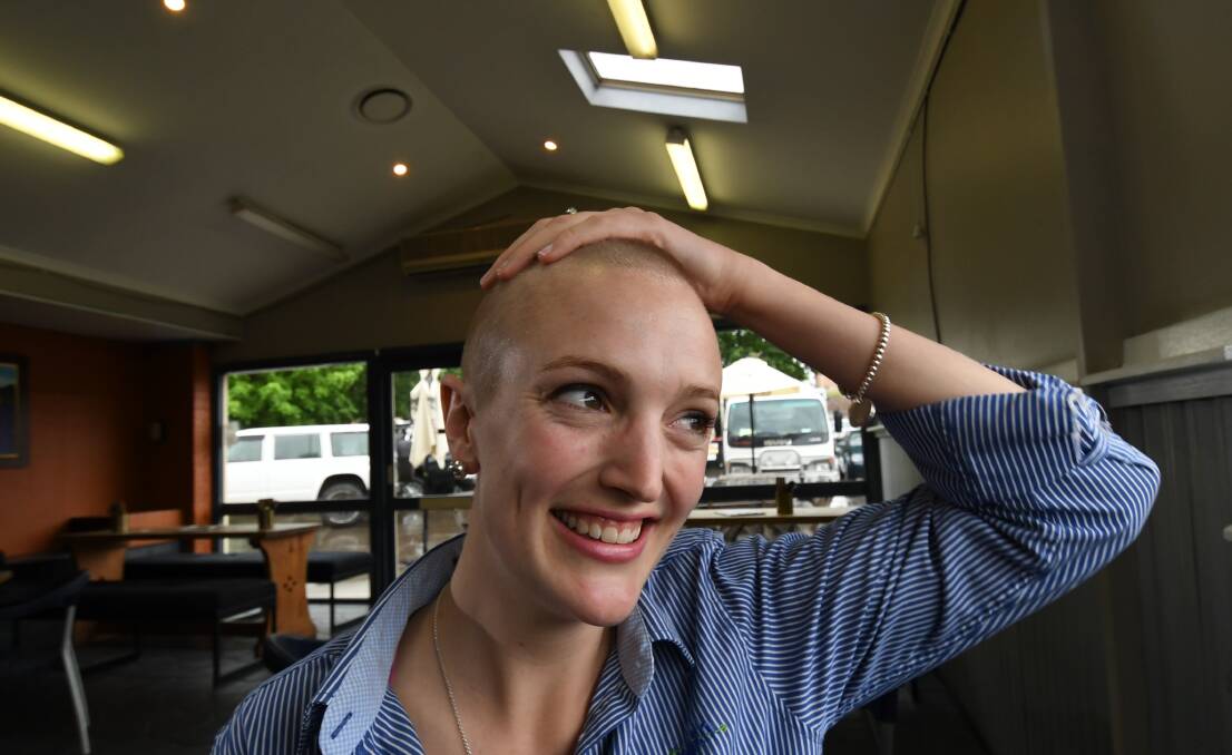 TOUCHING EXPERIENCE: Tamworth woman Em Sims has no regrets at all about lopping off her long blonde locks, raising more than $15,000 for mental health charities, and hopes it gets more people talking. Photo: Gareth Gardner