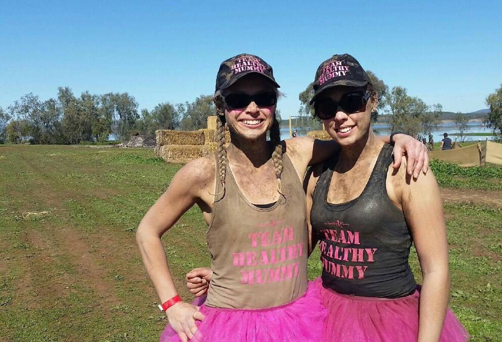 FIRST FUNDRAISER: Event organiser Lorna Williams (left), with Kirra Rogers, is gearing up for a mud run money drive for Tamworth Family Support Service. Photo: Supplied
