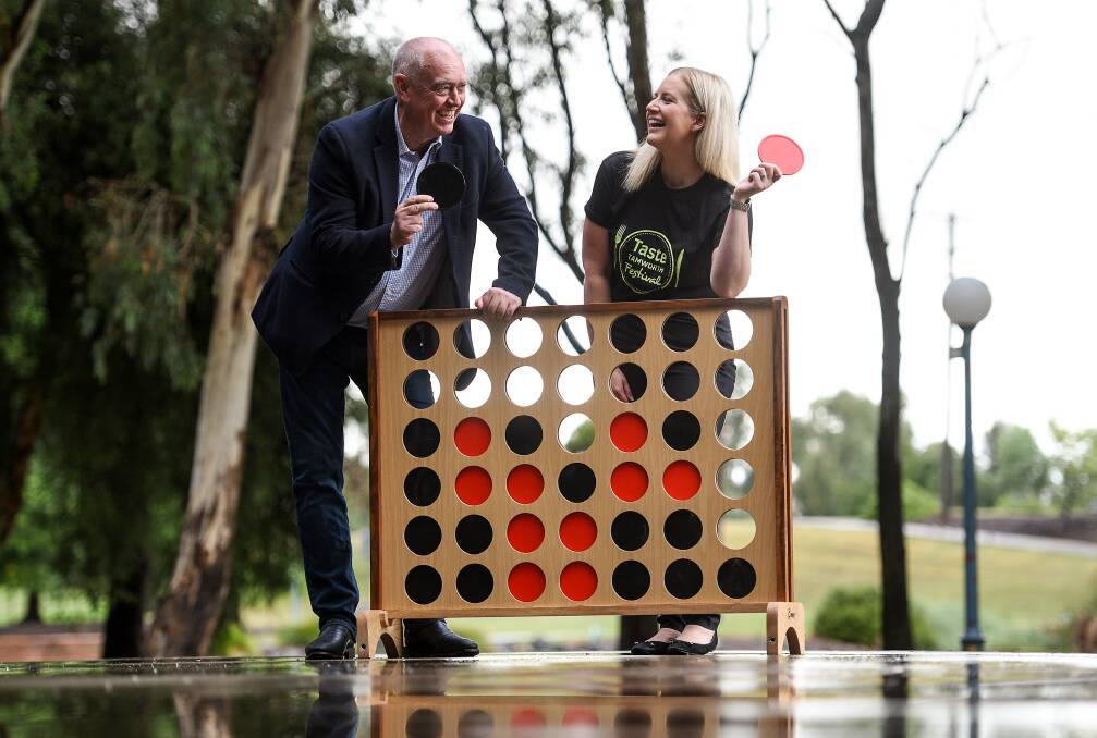 PIECE OF THE PUZZLE: Barry Harley and Taste in the Park coordinator Crystal Vero say food is a Tamworth tourist drawcard. Photo: Gareth Gardner 260417GGA03