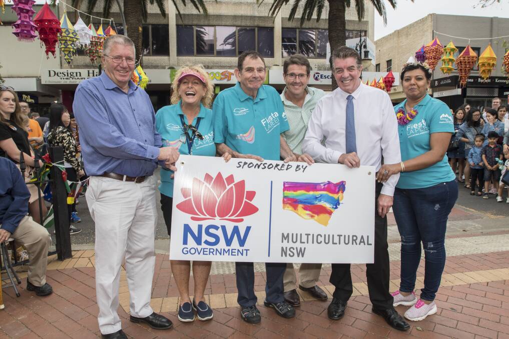 SUCCESS: From left: Mayor Col Murray, organiser Carol Hughes, Multicultural Tamworth's Eddie Whitham, Tamworth MP Kevin Anderson, Minister for Multiculturalism Ray Williams and a volunteer. Photo: Peter Hardin 141017PHD114