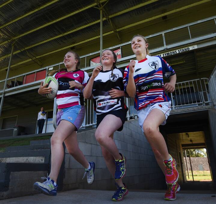 GIRLS TAKEOVER: From left, Elly Byriell, Holly Turnbull and Georgia Moore are three of more than 100 local girls signed up for an inaugural Tamworth rugby sevens competition. Photo: Gareth Gardner 161116GGE02