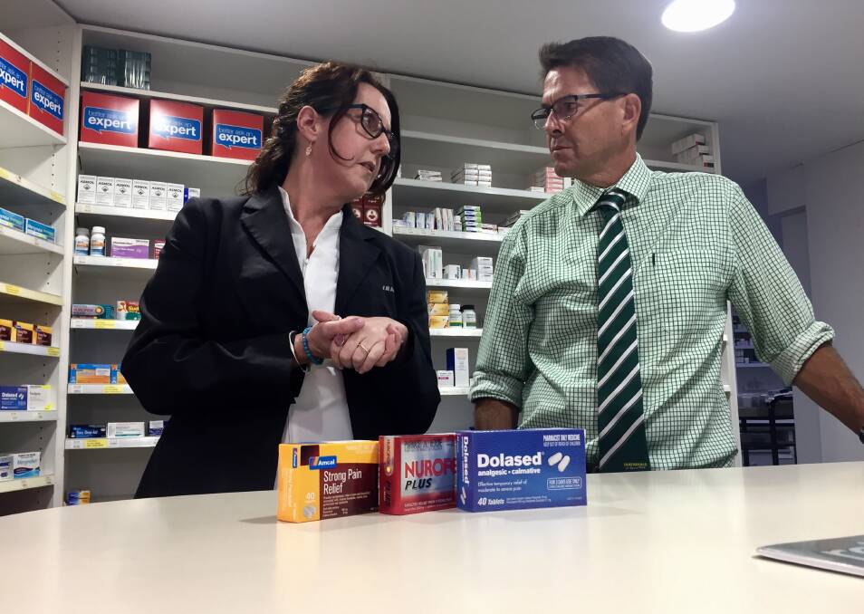 WAIT AND SEE: Amcal pharmacist Jacqui McCarthy with Tamworth MP Kevin Anderson. Photo: Jacob McArthur 150118JMB01