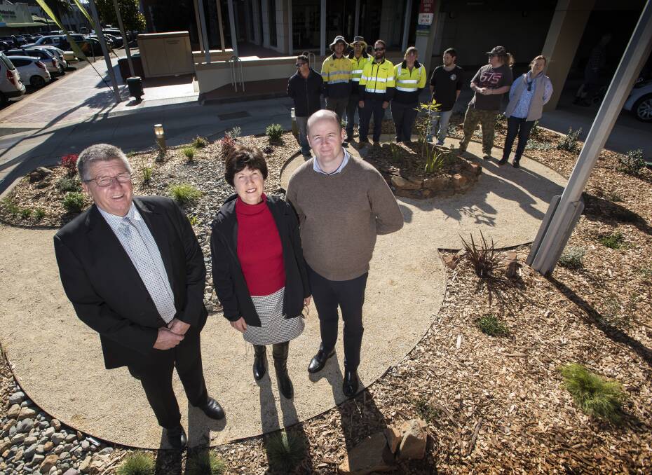 GROWTH: Mayor Col Murray, deputy mayor Helen Tickle and Tamworth Regional Council water sustainability officer Ian Lobban at the new low-water use garden in Peel St. Photo: Peter Hardin 260717PHC008