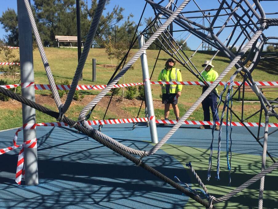 PRETTY ORDINARY: Tamworth Regional Council crews inspect the skywalk at Tamworth Regional Playground where vandals caused significant damage overnight. Photo: Jacob McArthur