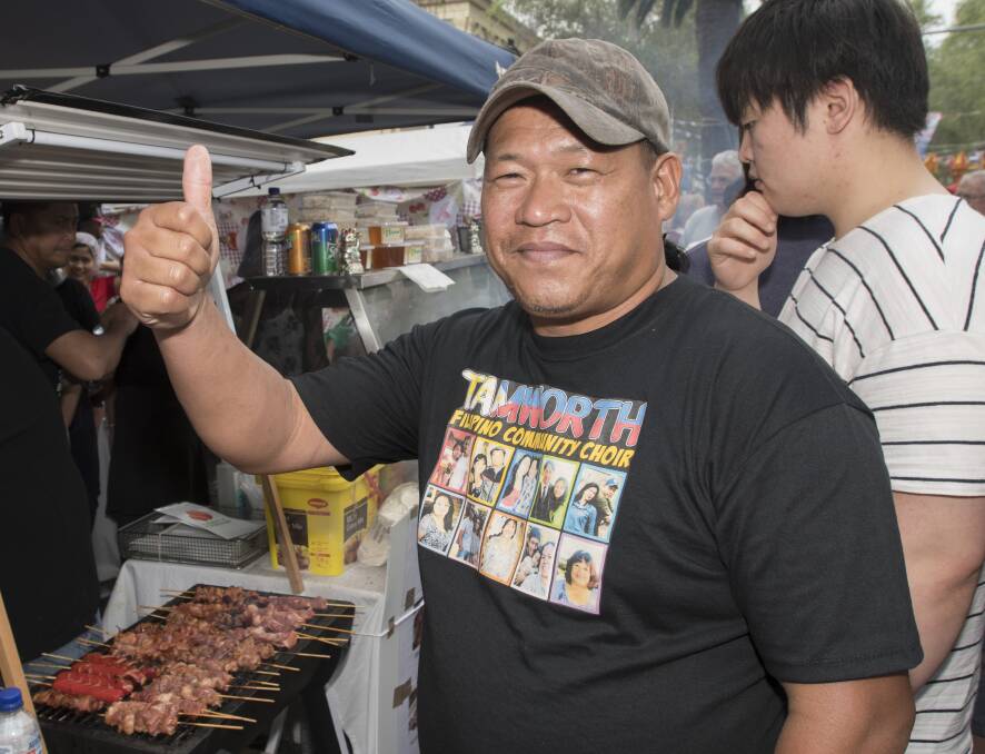 HAPPY DAYS: Rafael Villoso was one of more than 7000 people who checked out the global delicacies on offer at the region's biggest street food party hosted in Tamworth this weekend. Photo: Peter Hardin 141017PHD077
