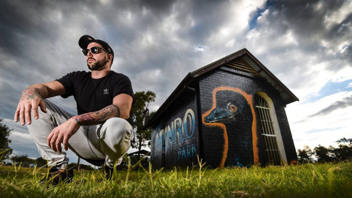 MAKING A MARK: Artist Shane Salvador has helped stem graffiti with his public pieces. Photo: Gareth Gardner 240417GGD02
