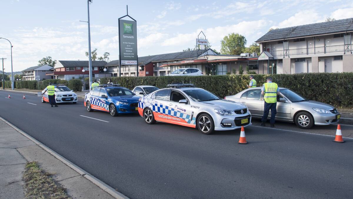 ONLINE LICENCE: A new government ID scheme means you wouldn't need a physical licence at a roadside police check. Photo: Peter Hardin