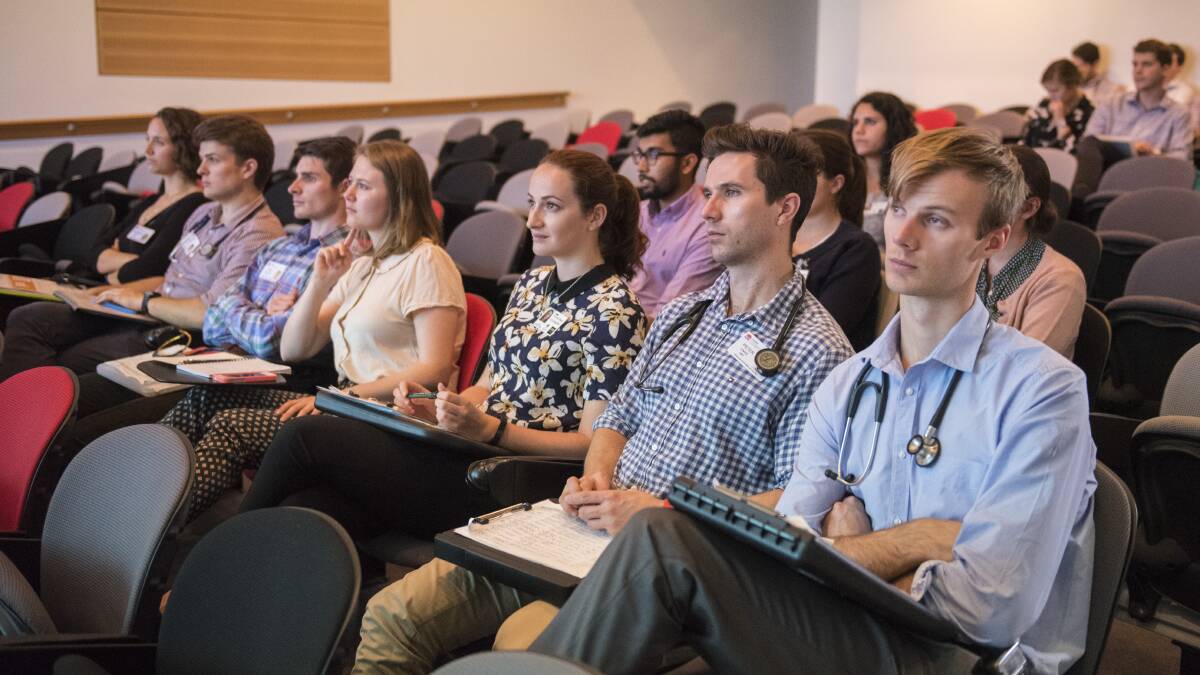 LONG CONSULT: About 60 young doctors and medical students were given the chance to quiz specialists about career paths. Photo: Peter Hardin 230517PHB011
