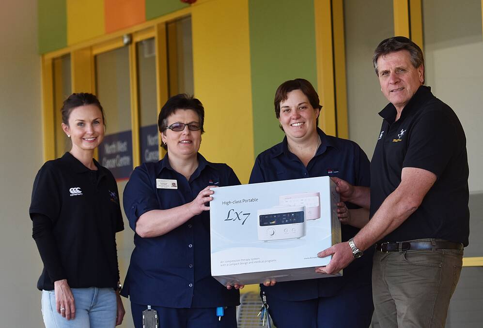 MUCH NEEDED: From left: Kate Wynne, nurses Rebecca Goldman and Pam Mallon and Pirates president Stuart Prowse making a donation. Photo: Gareth Gardner 260816GGE02