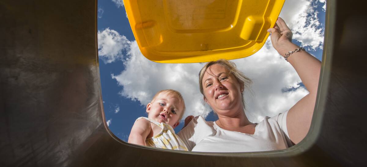 WASTE MATTERS: Tamworth mother Linda Cork, with daughter Lily Nixon, is gauging the town's desire for weekly recycling collection. Photo: Peter Hardin 191216PHG003