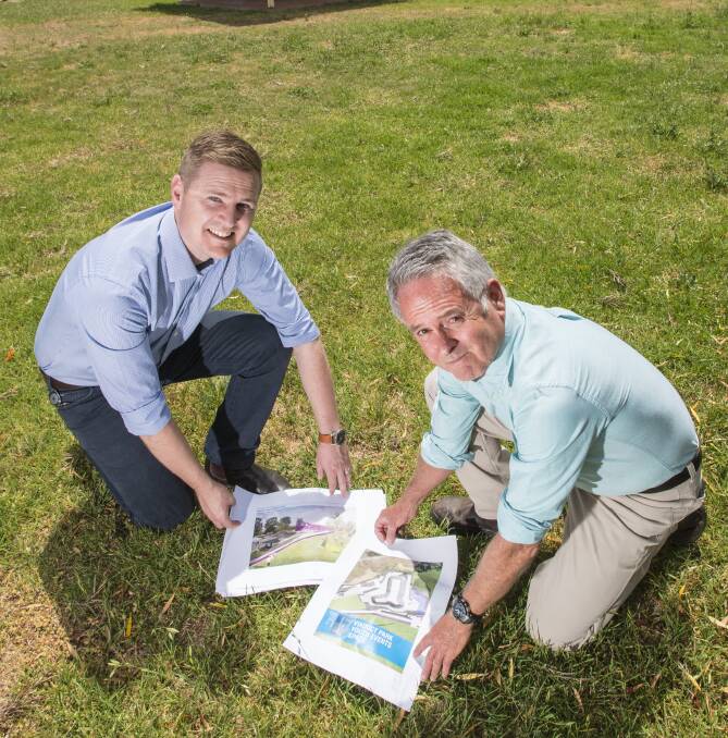 WORKSHOP: Tamworth Regional Council staff Sam Eriksson and Grant Reeckmann want locals to have their say on a big upgrade planned for an under-used Peel St Park. Photo: Peter Hardin: 281116PHC029