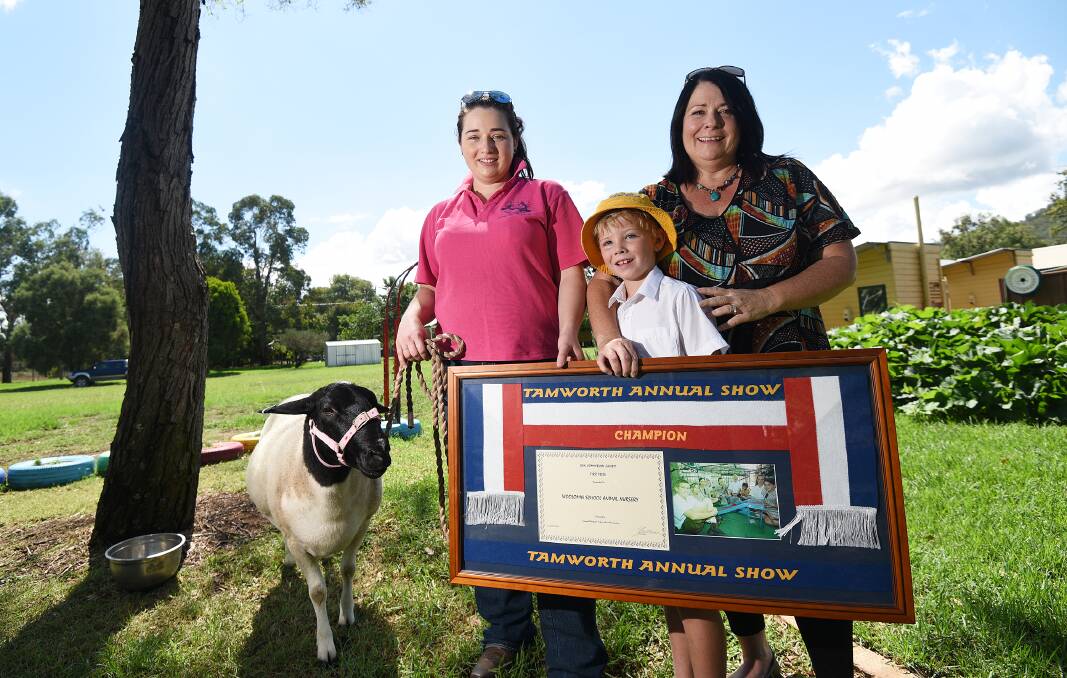 SHOW BUSINESS: Suzie the sheep, Steff McMahon, Tyler Woodard and Leisa McMahon from Woolomin Public School. Photo: Gareth Gardner 230317GGB05