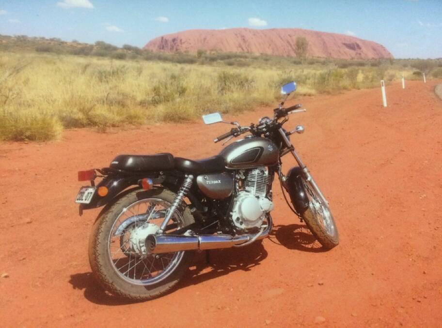 RED CENTRE: Barry's bike at Ayres Rock. Photo: Supplied