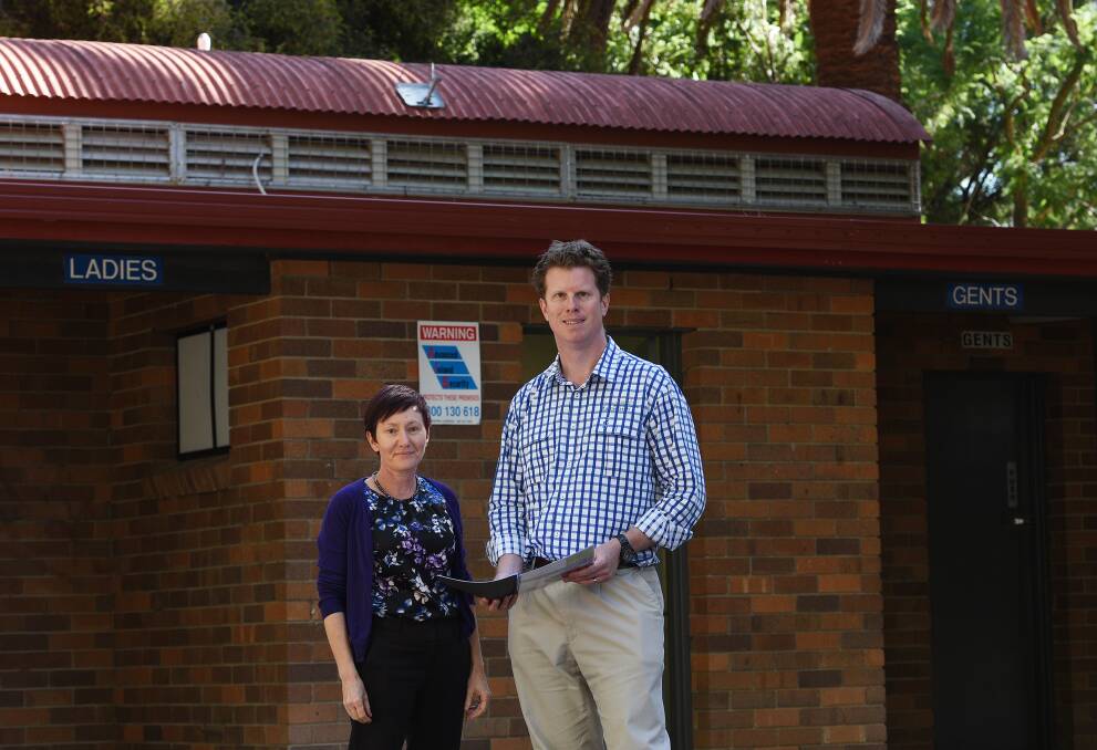 TOILET UPGRADE: Council staff Anna Russell and Brendan Moran have plans for an amenity overhaul. Photo: Gareth Gardner 100417GGD02