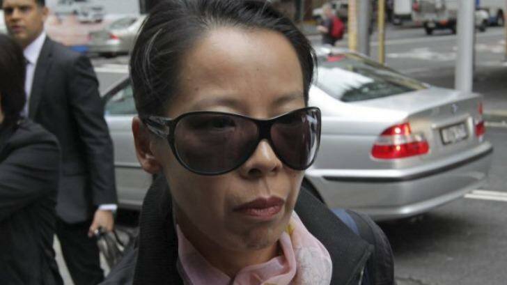 Robert Xie's wife Kathy Lin arrives at the Supreme Court during the trial. Photo: Dean Sewell