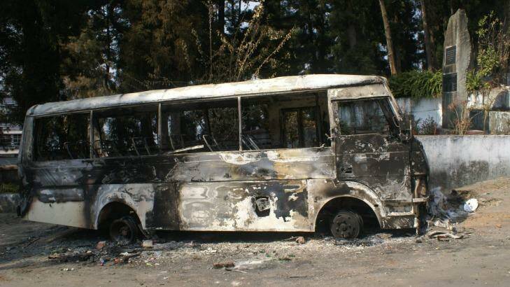 A bus torched in protests by Naga tribesmen over the election, due on February 1 but postponed. Photo: Amrit Dhillon