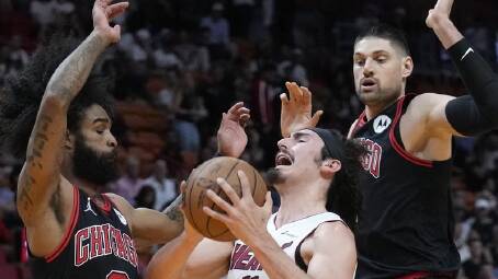 Rookie forward Jaime Jaquez Jr (c) helped Miami to a play-in tournament win over Chicago. (AP PHOTO)