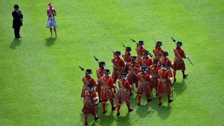 Yeomen of the Guard march during the garden party in the grounds of Buckingham Palace on Thursday. Photo: Ben Stansall