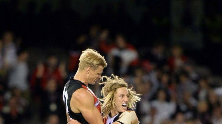 Nick Riewoldt shares Eli Templeton’s joy at his first goal. Photo: Mal Fairclough
