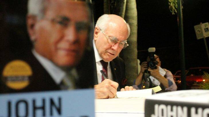 Former PM John Howard signs books in Redland City, east of Brisbane.  Photo: Judith Kerr