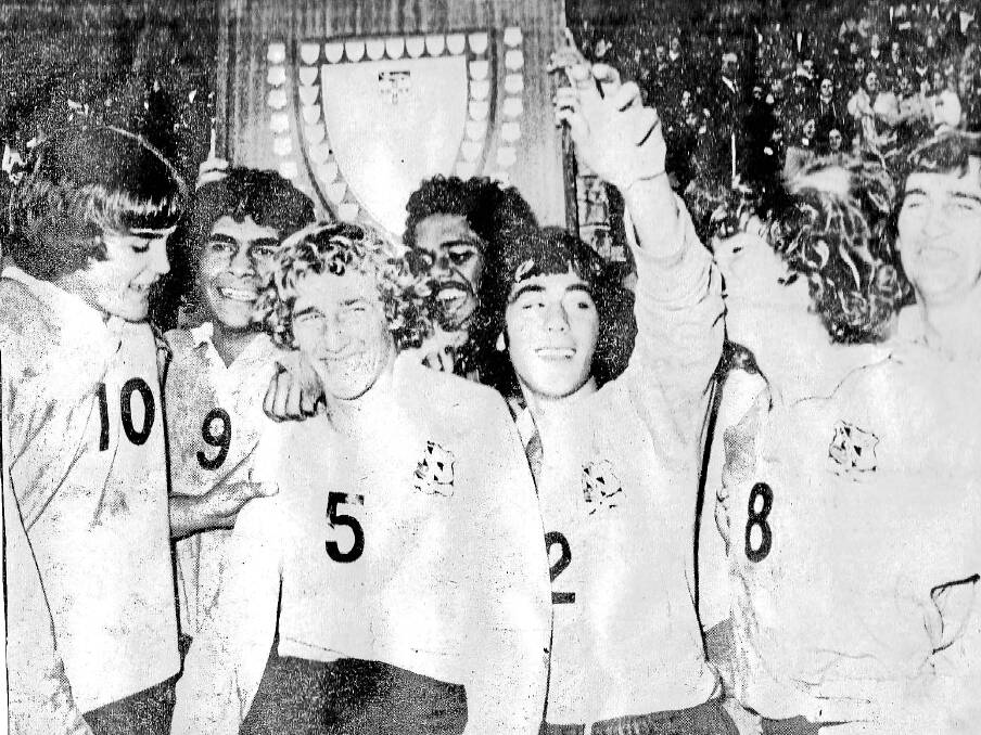 Bernie Briggs (at back second from left) and jubilant team-mates after winning the 1973 University Shield for Moree High School.