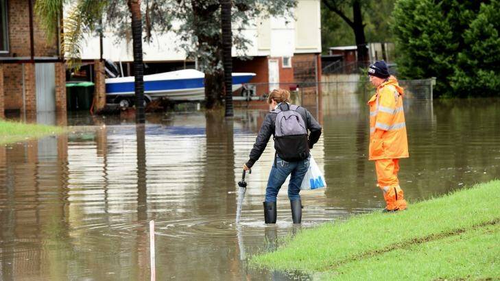 Residents in parts of south-west Sydney have been urged to evacuate immediately as flood waters continue to rise Photo: Steven Siewert