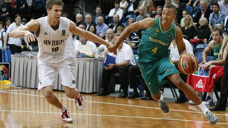 Dante Exum playing for the Boomers against New Zealand at the AIS Arena in 2013. Photo: Jeffrey Chan