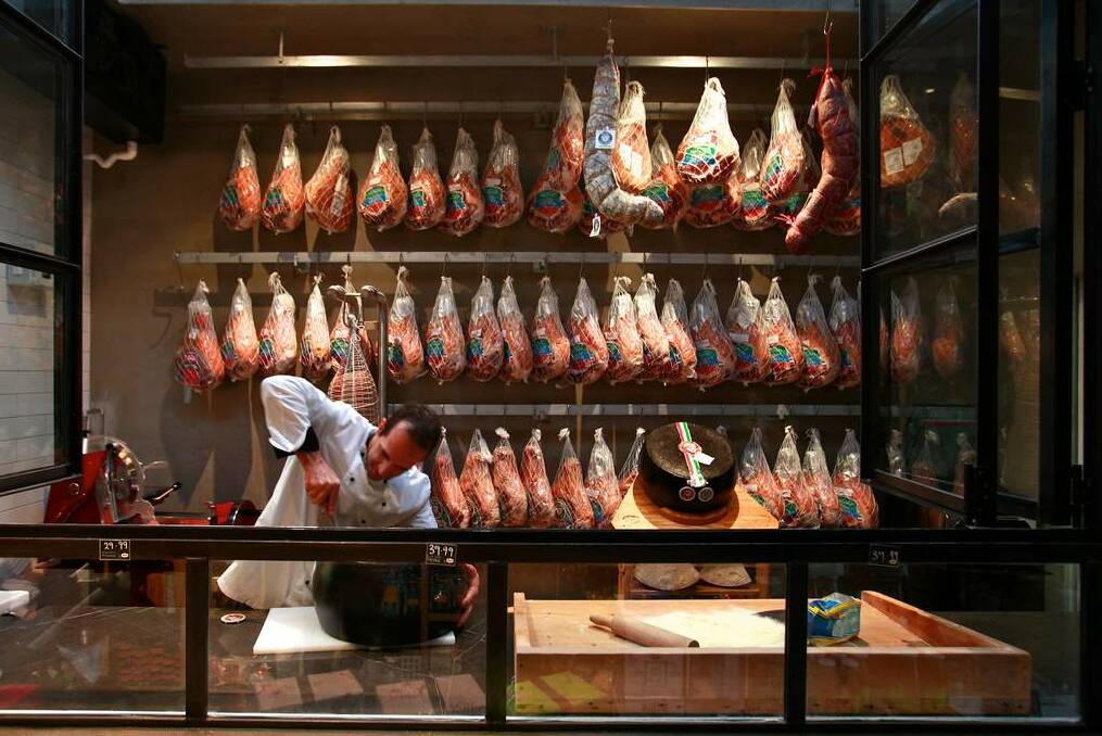 D.O.C Delicatessen has a glass-walled, climate-controlled room that houses an immense collection of imported and local cured meats. Photo: Eddie Jim