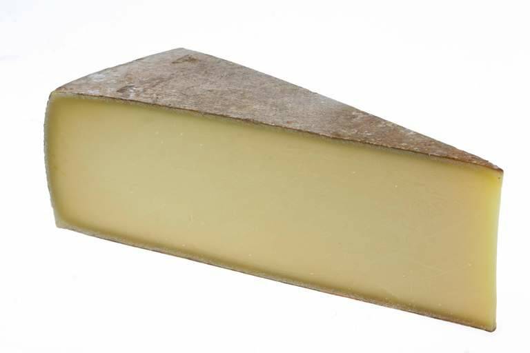 There's always parmesan, comte and good English farmhouse cheddar cheese in the chef's fridge. Photo: Estelle Grunberg
