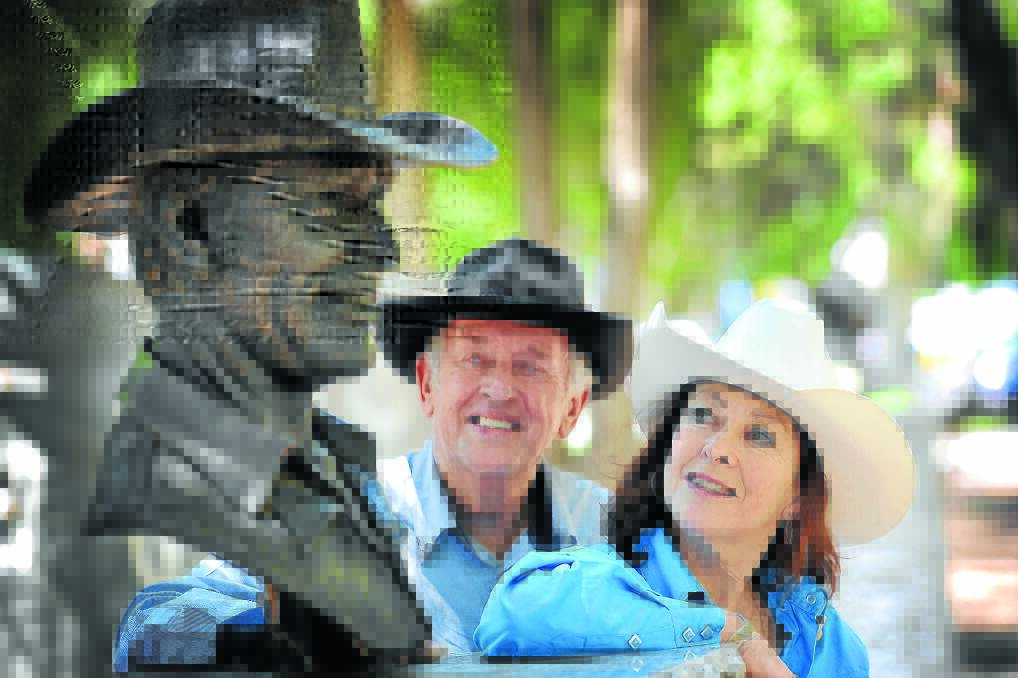KEEPING BALLADS ALIVE: Peter Simpson and Dianne Lindsay looking forward to the Best of the Bush concert tonight, here with the bust of Dianne's father, Reg Lindsay. Photo Paul Mathews 180116PME10