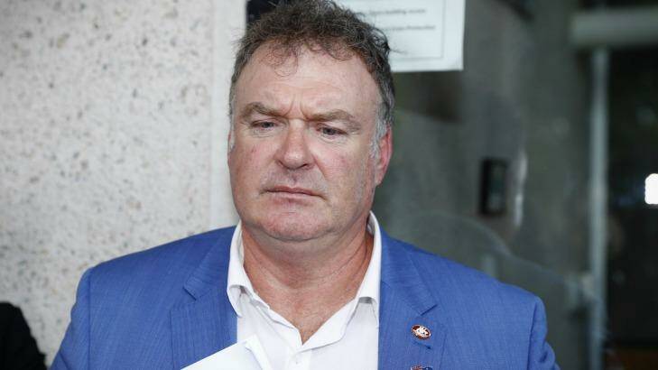 Rod Culleton, with his  Australian Senator pin on display, departs the High Court earlier this week.  Photo: Alex Ellinghausen