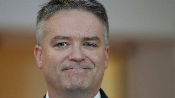 Finance Minister Mathias Cormann says the government has yet to decide whether to privatise Australian Hearing. Photo: Alex Ellinghausen