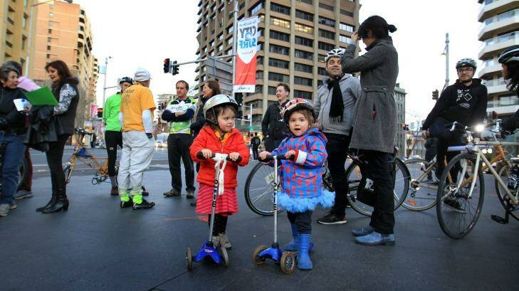 Youngsters at a protest by cyclists against government moves to remove a cycleway in Sydney. Photo: James Alcock