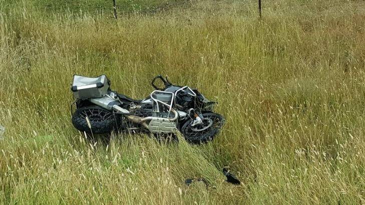 The damaged motorcycle beside the road after the accident that happened between Bombala and Cooma on Friday. Photo: Supplied