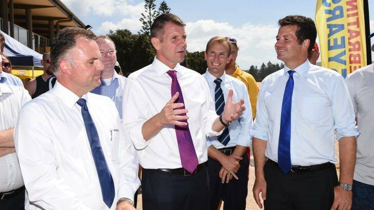 Premier Mike Baird, with Gosford MP Chris Holstein, left and The Entrance Liberal candidate Michael Sharpe, right, at Terrigal.   Photo: Brendan Esposito