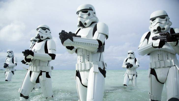 Stormtroopers prove they ain't afraid of no damp in Rogue One: A Star Wars Story. Photo: Disney