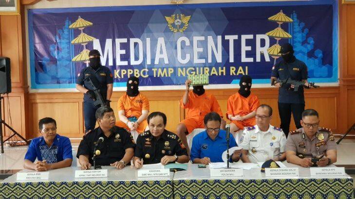 Three men arrested on drug charges in Bali, paraded for the media on Tuesday Dec 19. from left Australian, Malaysian and American.
Unrelated?? cases.