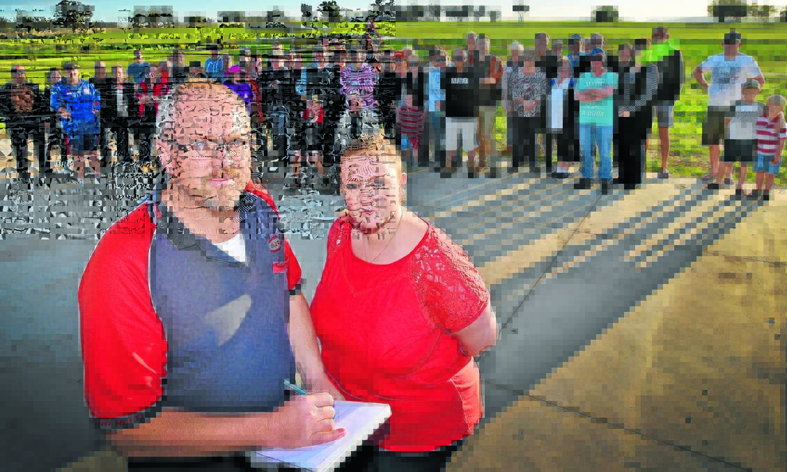 PLEASE EXPLAIN: Tim Paton and Amanda Boyd – with the backing of dozens of fellow Hills Plains residents – want Tamworth Regional Council to rethink its rate rise for the area. Photo: Geoff O'Neill 020815GOH02