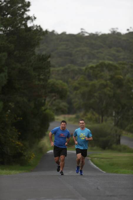 HERALD, NEWS, HALF MARATHON Pic taken 23rd March 2017 of LtoR, Nathan Johnston and Nathan Shoemark. RE, Nathan and Nathan are running together in the upcoming Sydney Morning Herald Half Marathon. Nathan J is legally blind and Nathan S will be running as his guide - they both hold a piece of material and run side by side. Picture: Robert Peet Photo: Robert Peet