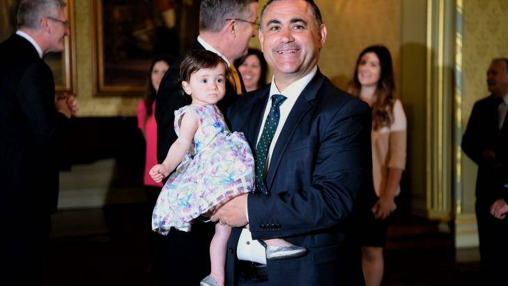 Leader of NSW National party John Barilaro holding his 1yr old daughter Sofia Barilaro moments before being sworn in as NSW Deputy Premier at Government House Photo: Kate Geraghty