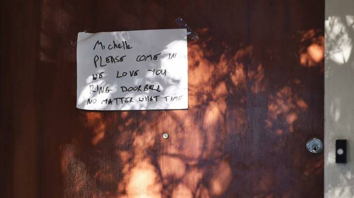 A note posted on the front door of the Levy family home. Photo: Nick Moir