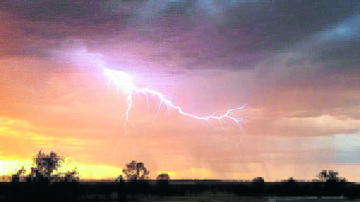 NO SPECIAL EFFECTS HERE: Hallsville's Tori Grant captured a sunset shower and lightning bolt.