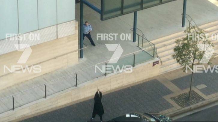 Video footage showing Farhad Khalil Mohammad Jabar pointing a gun at an officer has emerged. Photo: Channel Seven