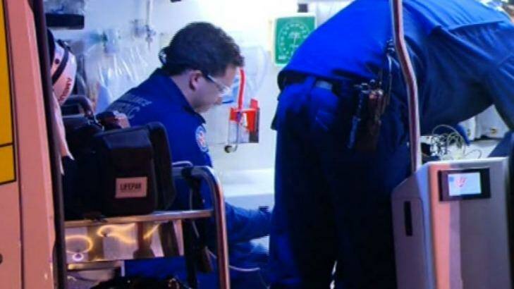 Paramedics took the injured man to Liverpool Hospital, where he died. Photo: Nine News